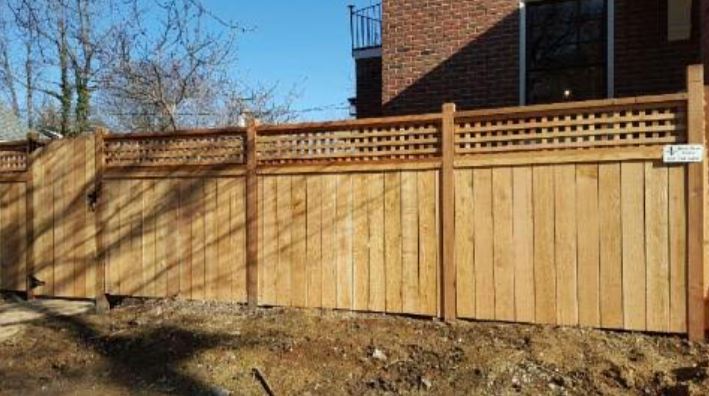 wood fence installation on residential property