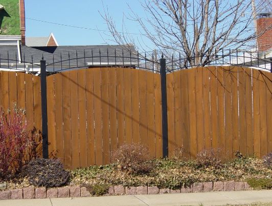 fencing company installs wrought iron fence